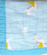 Cotton baby swaddleblanket with unicorn designs .