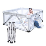 White playpen with a child indoor outdoor kids Activity center.