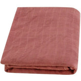 Folded pinkish-red fabric BambooCotton wrap solidcolor baby swaddle blanket wrap