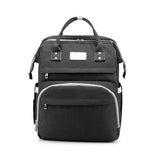 Black backpack with multiple zippers.