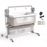 Automatic swing cot bedside Baby crib with monitor, power adapter, and remote control .