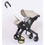  4 in 1 beige Baby stroller and car seat .