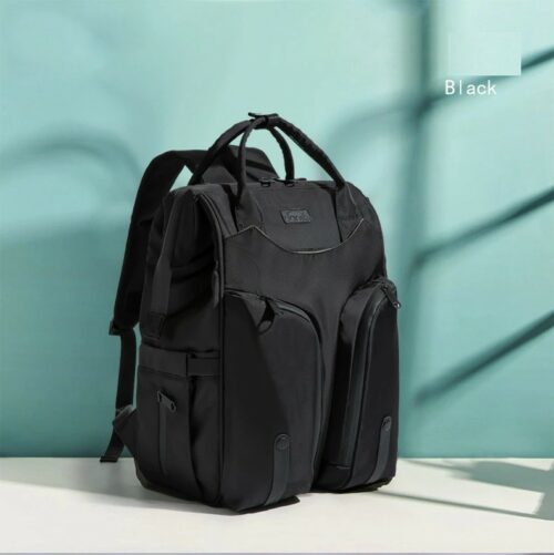 Multifunctional waterproof black travel backpack with a large-capacity interior, multiple storage compartments, durable construction, and a practical design for carrying essentials on trips.