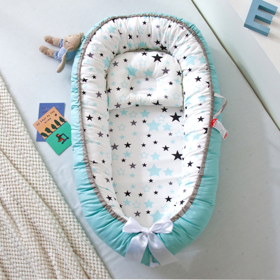 Baby nest organic breathable crib with star pattern .