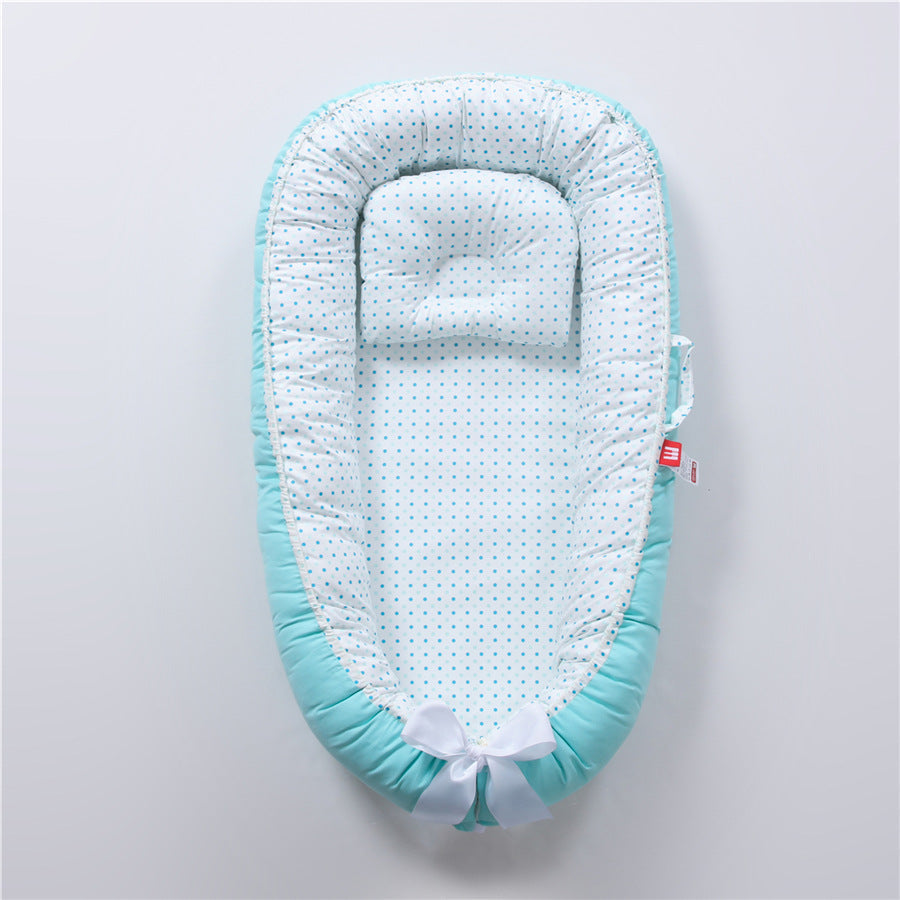 Baby nest with blue and white pattern