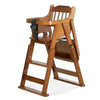 Wooden high chair with a black strap .