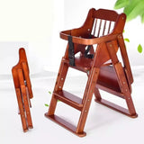 Wooden high chair with a folded ladder .
