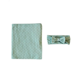 Mint green polka dot headband and swaddle blanket wrap.