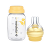Medela baby bottle with yellow cap 