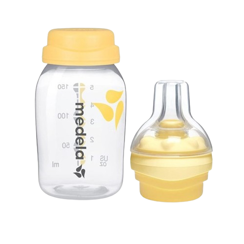 Medela baby bottle with yellow cap 