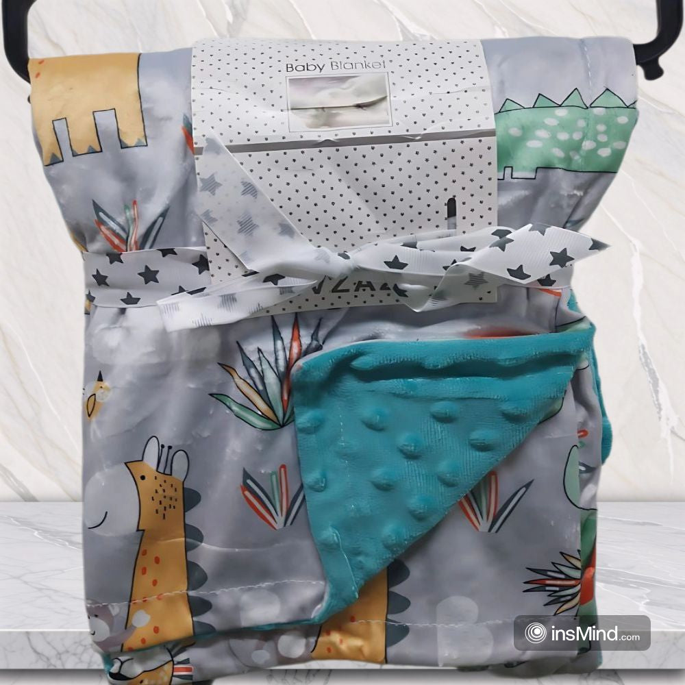 Baby blanket with cartoon animal design .