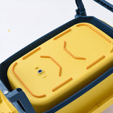 Yellow Baby bathtub with blue rim and red stitching details .