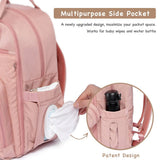 Pink multipurpose baby changing backpack with spacious storage and side pockets, featuring a baby wipe pack and water bottle, designed for convenient organization of diapers and everyday baby essentials.