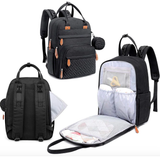 Black multifunctional baby nappy changing backpack with multiple compartments and a removable diaper bag insert, providing organized storage for diapers, bottles, wipes, clothing, and other baby essentials.