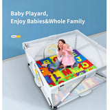 Baby playpen with colorful alphabet mat and a child playing on it.