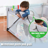 Child playing inside a portable playpen .