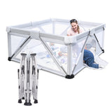 White playpen with a child playing inside the play yard.