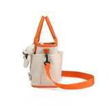 Beige and orange Diaper bag with a strap 