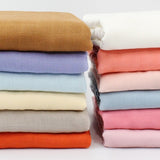 Stacks of colorful BambooCotton wrap solidcolor baby swaddle blanket wrap