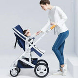 Woman pushing a blue and white belecoo stroller with a child .
