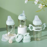 Set of breast milk baby bottles with accessories 
