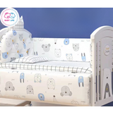 Children's crib and bedding set with cartoon animal pattern and 'Baby Life' branding.