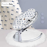 Baby swing with whale pattern fabric.