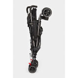 Black lightweight Mothercare Nanu stroller with a compact, easy-folding umbrella design, adjustable reclining seat, five-point safety harness, swivel front wheels, and protective hood.