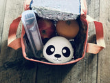 Panda-shaped container with fruits 