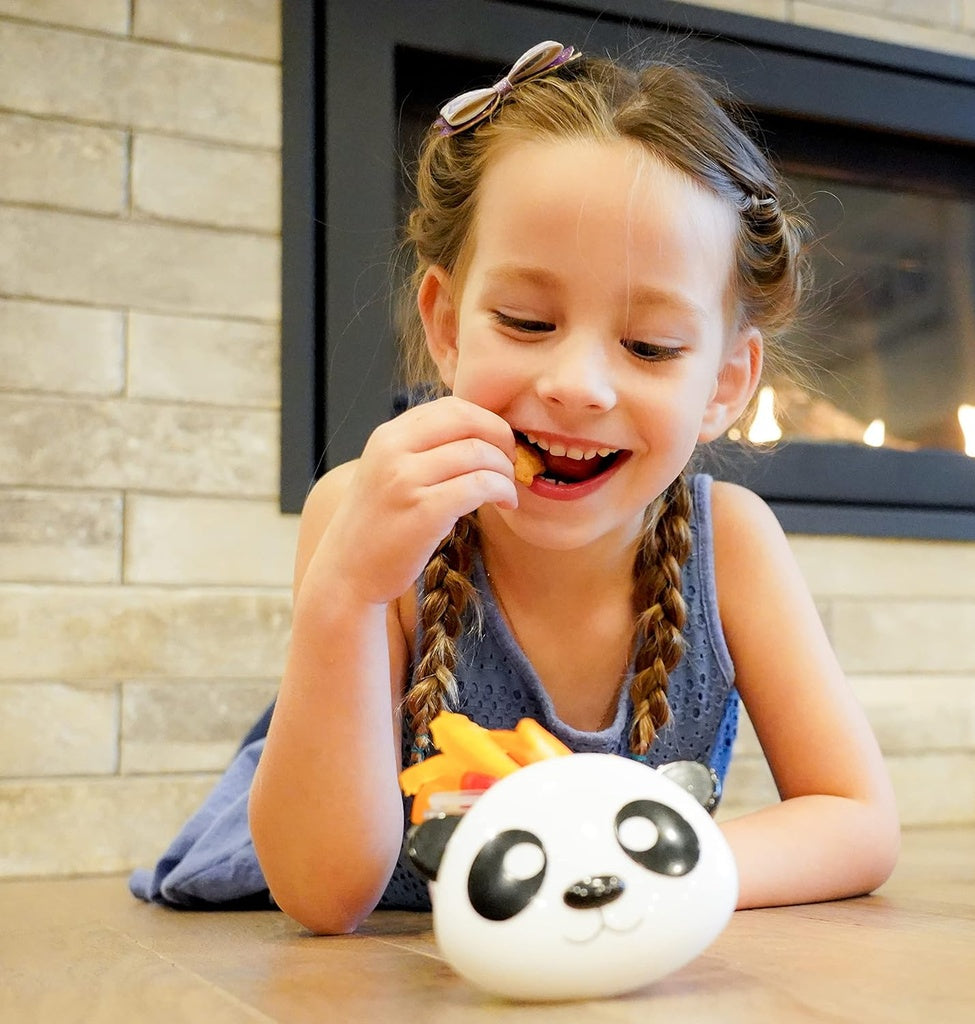 Girl eating in a panda-shaped Meli bowl