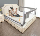 Portable toddler Bed safety rail with a family sitting on a bed in a bedroom setting.