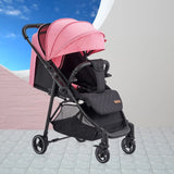 Reversible luxury light weightPink and black stroller .