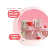 Roots & Glow Cosmetic set with a pink bow, including bottles and containers.