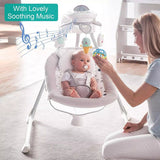Baby seated in a white musical vibrating bouncer swing, with a woman holding a toy nearby and colorful rotating light-up toys above the baby.
