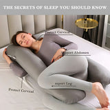 Woman lying on a U-shaped body pillow with labeled benefits .