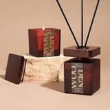 Luxury wood tone scented candle and diffuser set.