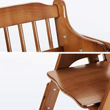 Wooden high chair with a close-up of the seat and backrest on a white back.