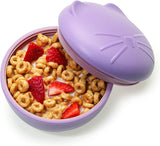 Purple cat-shaped silicone bowl with cereal and strawberries 